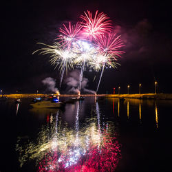 Firework display at night