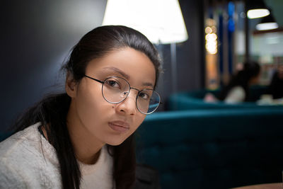 Close-up portrait of young woman