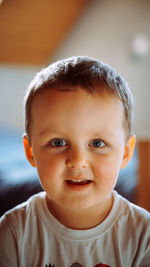 Close-up of cute boy looking away