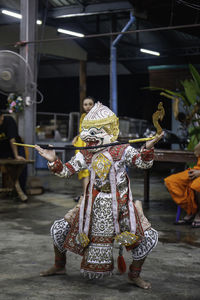 Rear view of woman wearing traditional clothing