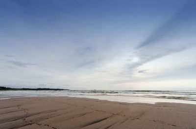 Scenic view of beach against sky