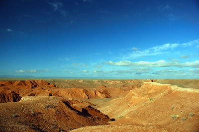 Scenic view of desert against sky