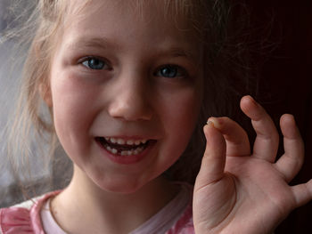 Close-up portrait of a smiling girl