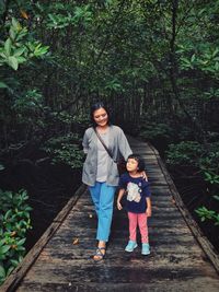 Enjoying walking in the mangrove forest with my baby girl