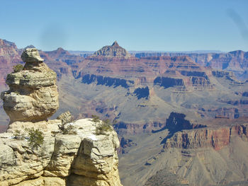 Panoramic view of rock formations against sky