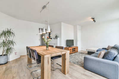 Chairs and table against wall at home