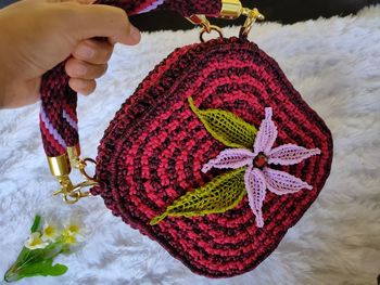 Close-up of woman holding ice cream cone