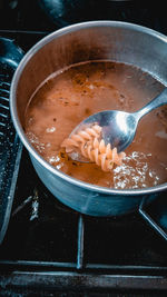 High angle view of soup in cooking pan