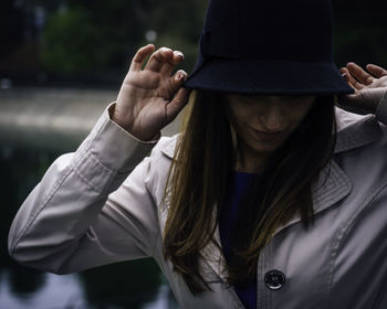 Portrait of woman wearing hat