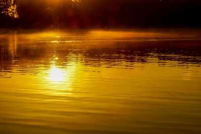 Reflection of sky in calm lake