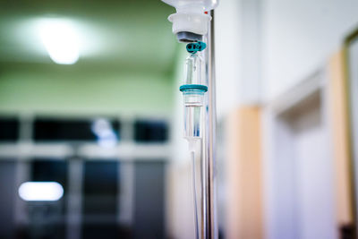 Close-up of glass door of building