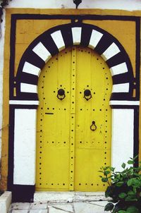 Close-up of yellow door
