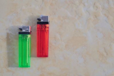 High angle view of red wine on table against wall