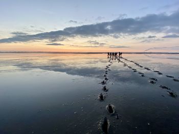 Scenic view of sea against sky during sunset