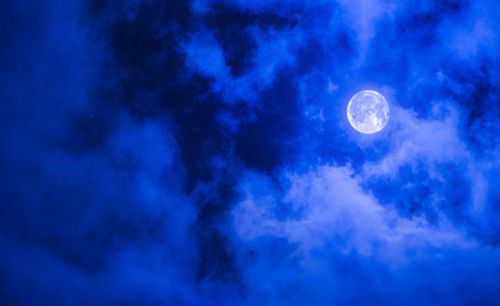 Low angle view of moon in sky