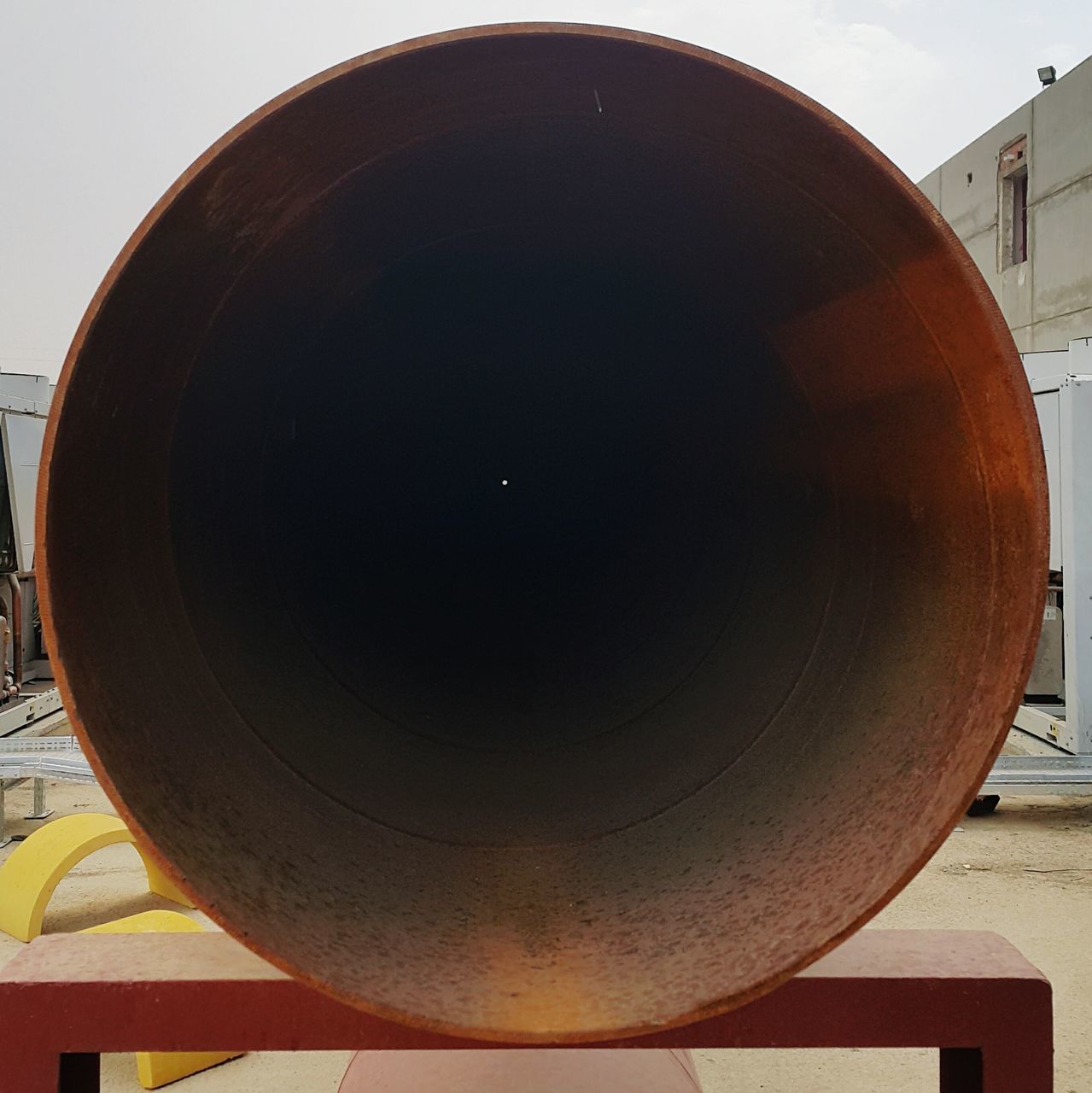 circle, built structure, architecture, geometric shape, building exterior, sky, no people, outdoors, round, shape, close-up, day, metal, sphere, low angle view, sunlight, industry, circular, lighting equipment