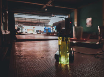 Close-up of wine bottles on table in restaurant