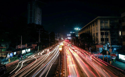 Light trails on city street at night