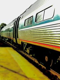 Close-up of train against sky