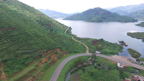 High angle view of road amidst mountains against sky