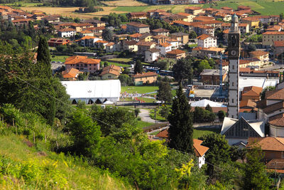 High angle view of townscape and trees in town