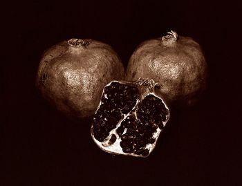 Close-up of fruit against black background