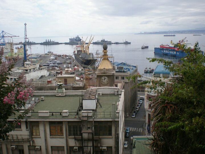 BOATS MOORED IN HARBOR