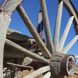 Low angle view of rusty wheel