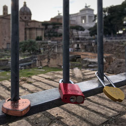 Close-up of old padlock on building