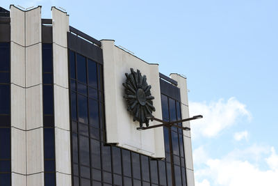 Low angle view of building against clear blue sky