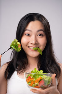 Portrait of a woman with ice cream