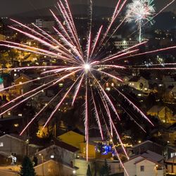 Firework display at night