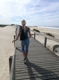 Full length of woman on beach