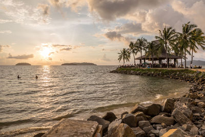 Scenic view of sea against sky at sunset