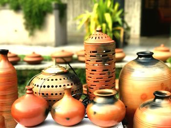 Close-up of earthenware in market for sale