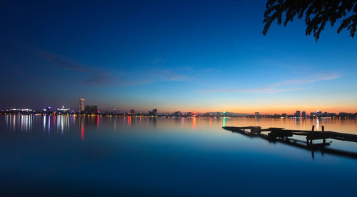 Scenic view of sea against sky at night