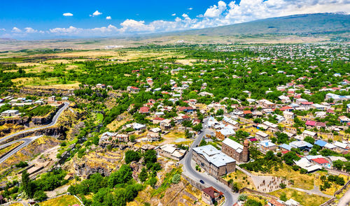 High angle view of trees and houses against sky