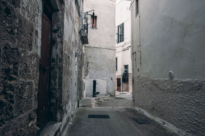 Narrow alley along buildings