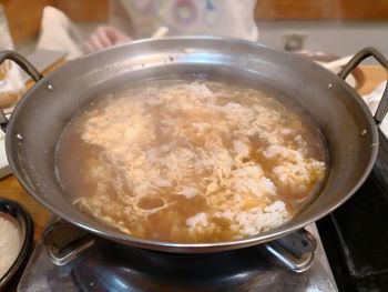 High angle view of meat in cooking pan