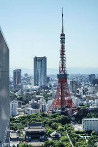 Buildings in city against sky