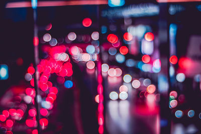 Defocused image of illuminated lights at night