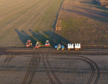 High angle view of trucks on field