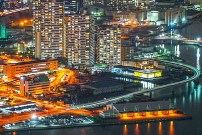 Illuminated buildings in city at night