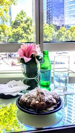 Close-up of cake on table against window