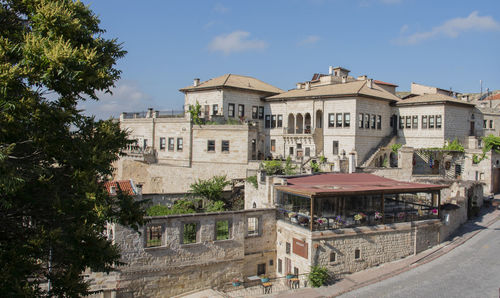 Buildings in city against sky