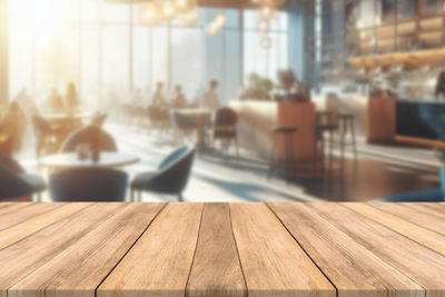 Close-up of wooden table at restaurant