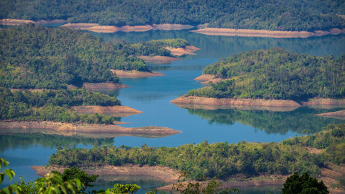 Scenic view of lake by trees