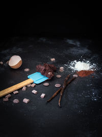 High angle view of dessert on black background