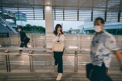 Blurred motion of people walking at airport