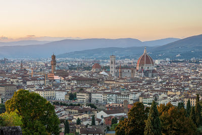 High angle view of townscape against sky during sunset